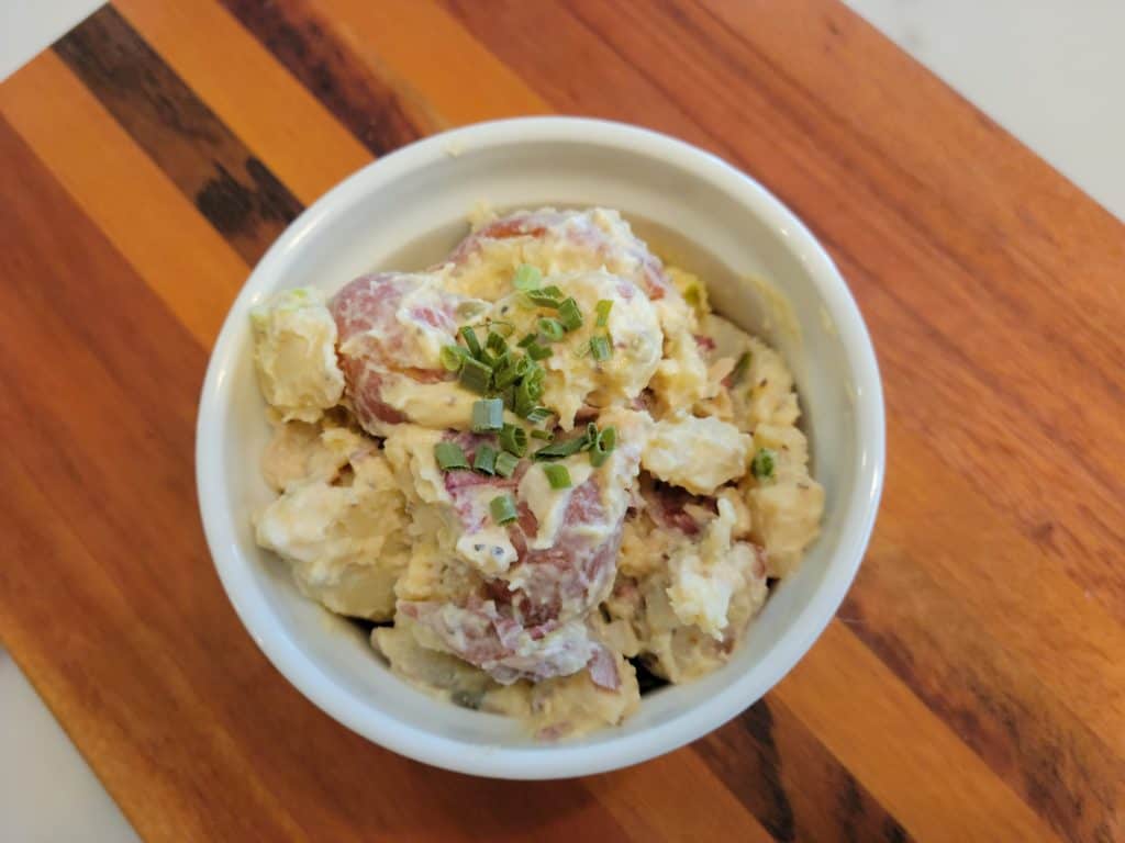 bowl of Red Hot And Blue Potato Salad Copycat Recipe